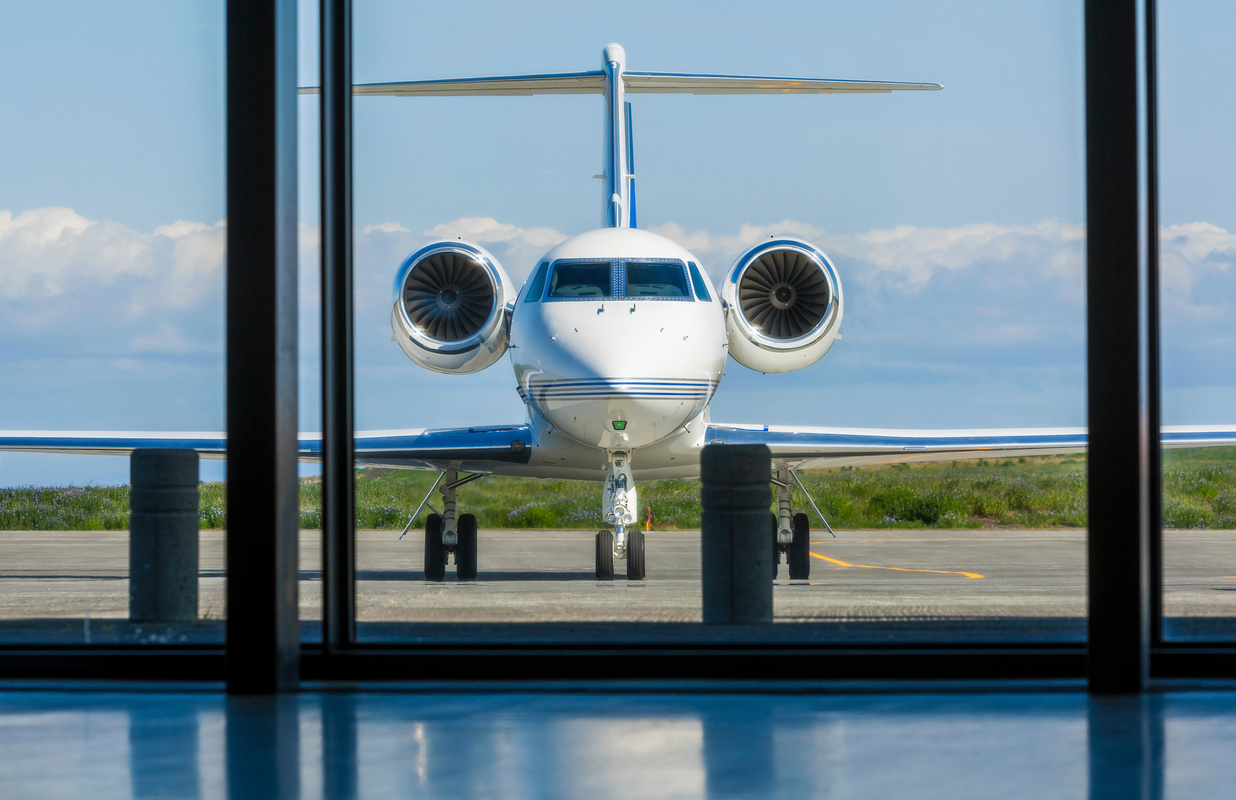 Private Corporate Jet Airplane at an Airport